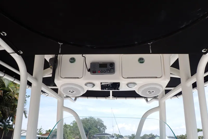 Slide: The Image of 2015 Century 2301 Center Console boat with overhead electronics and speakers. - 7
