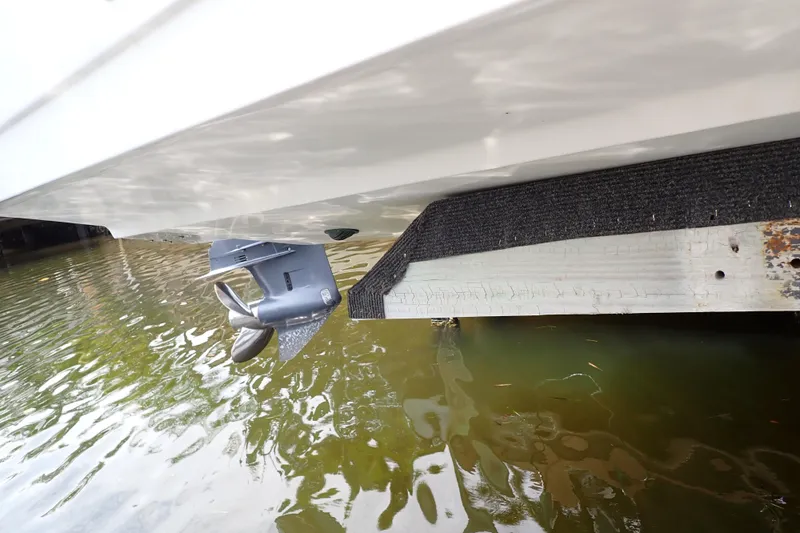 Slide: The Image of Century 2301 Center Console 2015 boat propeller and hull above water. - 78