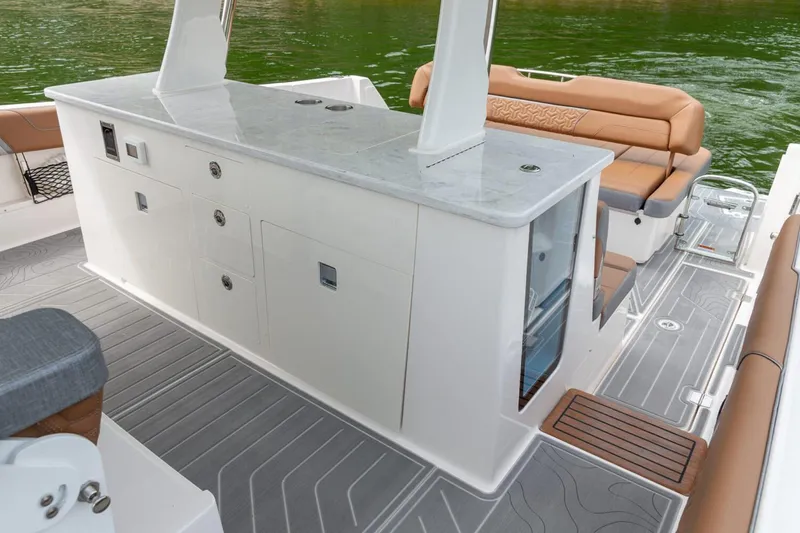 Slide: The Image of Manufacturer Provided Image: 2026 Regal 38 Surf boat interior with sleek seating and modern amenities. - 11