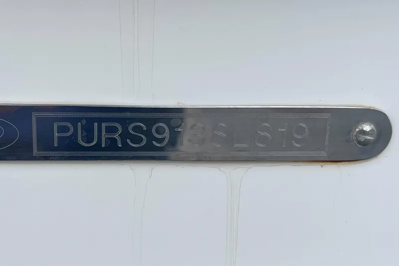 Slide: The Image of VIN plate on a 2019 Pursuit S 288 Sport boat, displaying "PURS913SL819". - 4
