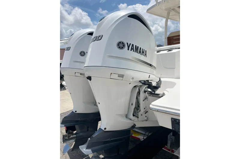 Slide: The Image of Twin Yamaha outboard engines on a 2019 Pursuit S 288 Sport boat. - 5