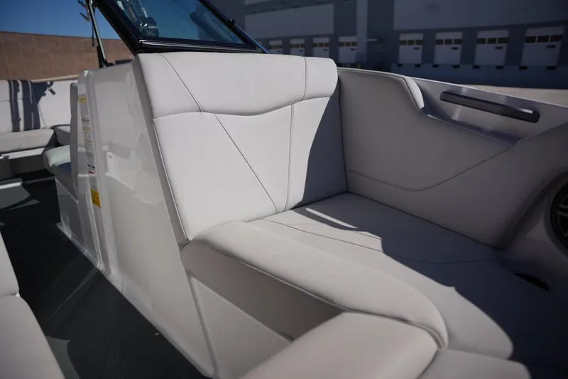 Slide: The Image of 2020 MasterCraft NXT20 boat interior with sleek, modern seating design. - 10