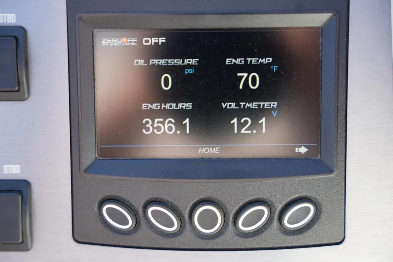 Slide: The Image of Dashboard display of a 2020 MasterCraft NXT20 showing engine metrics and controls. - 11