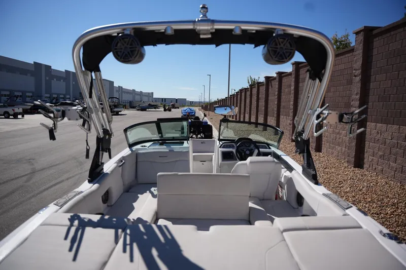 Slide: The Image of 2020 MasterCraft NXT20 boat interior with seating and wakeboard tower. - 18