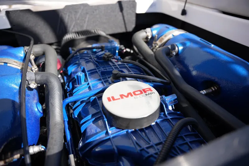 Slide: The Image of Ilmor engine in 2020 MasterCraft NXT20 boat, showcasing blue components and branding. - 19