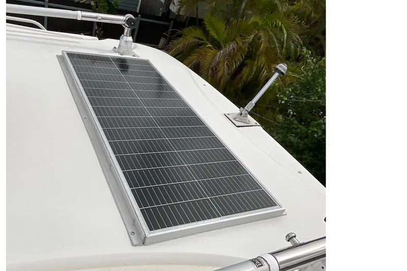 Slide: The Image of Solar panel installed on 2005 Seaswirl Striper 2901 Walkaround O/B boat roof. - 11