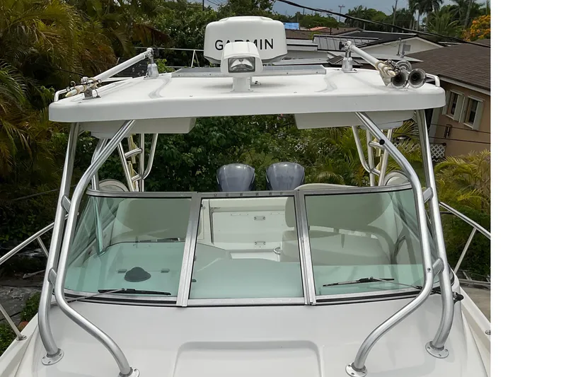 Slide: The Image of 2005 Seaswirl Striper 2901 Walkaround O/B boat with Garmin radar, front view. - 2