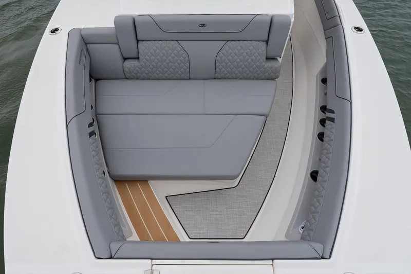 Slide: The Image of Manufacturer Provided Image: 2026 Regal 34 SAV boat interior with luxurious gray seating and elegant design. - 4