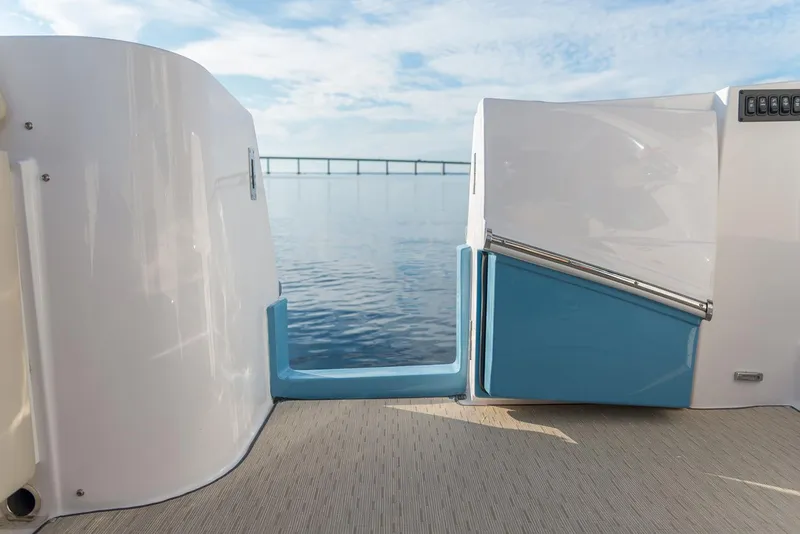 Slide: The Image of Manufacturer Provided Image: 2026 Regal 33 SAV boat deck with ocean view and distant bridge. - 5