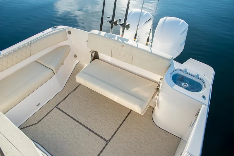 Slide: The Image of Manufacturer Provided Image: 2026 Regal 33 SAV boat interior with seating and dual engines. - 7