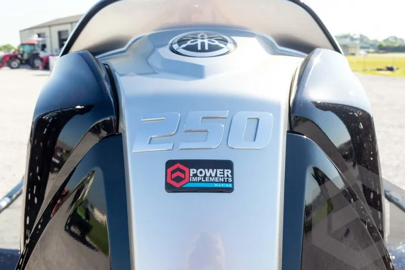 Slide: The Image of Close-up of 2026 Skeeter ZXE20 engine with "250" and Power Implements Marine logo. - 25