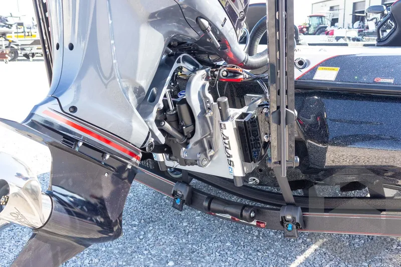 Slide: The Image of 2026 Skeeter ZXE20 boat engine detail with Atlas hydraulic jack plate. - 26
