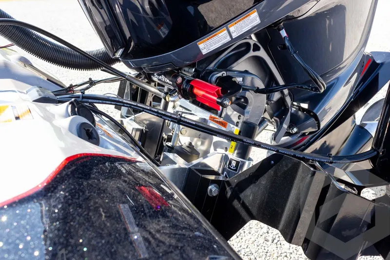 Slide: The Image of Close-up of 2026 Skeeter ZXE20 boat engine components and wiring. - 27