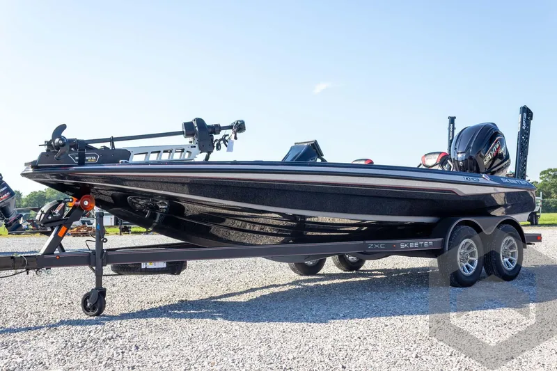 Slide: The Image of 2026 Skeeter ZXE20 bass boat on trailer, featuring sleek design and modern equipment. - 3