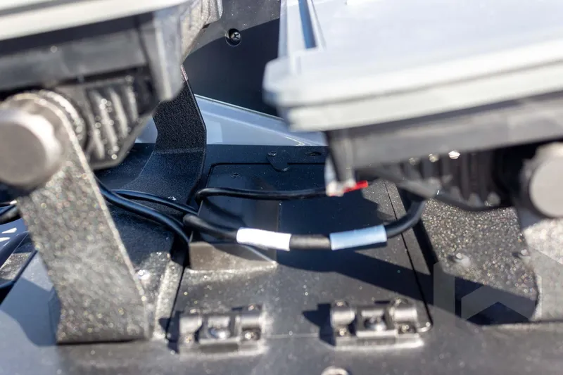 Slide: The Image of Close-up of Skeeter ZXE20 boat components, showcasing wiring and mounting details, 2026 model. - 30