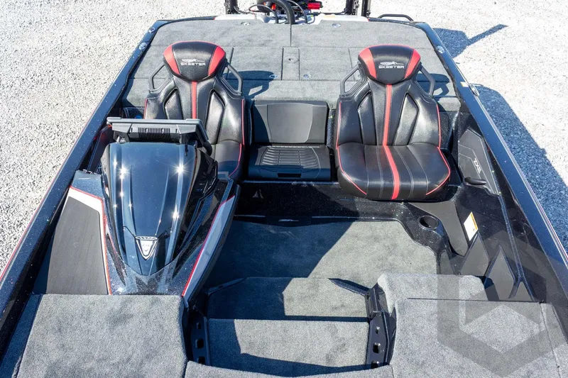 Slide: The Image of 2026 Skeeter ZXE20 boat interior with black and red seats, sleek design. - 39