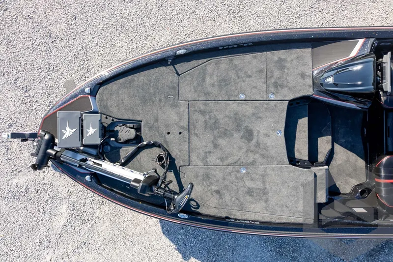 Slide: The Image of 2026 Skeeter ZXE20 boat deck with trolling motor and storage compartments. - 58
