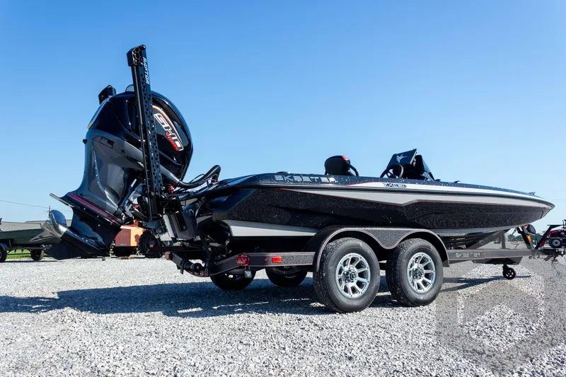 Slide: The Image of 2026 Skeeter ZXE20 boat on trailer, featuring sleek design and powerful engine. - 9