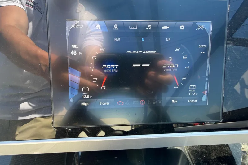 Slide: The Image of 2023 Yamaha Boats AR250 dashboard display showing fuel level and RPM gauges. - 19