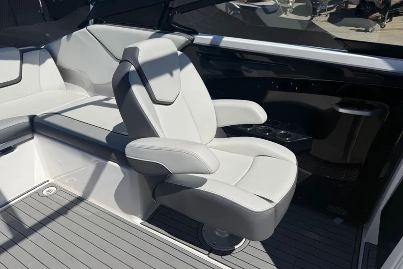 Slide: The Image of 2023 Yamaha Boats AR250 interior with sleek seating and modern design. - 22