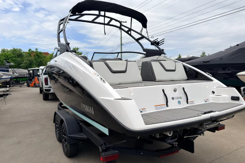 Slide: The Image of 2023 Yamaha Boats AR250 on trailer, showcasing sleek design and modern features. - 3