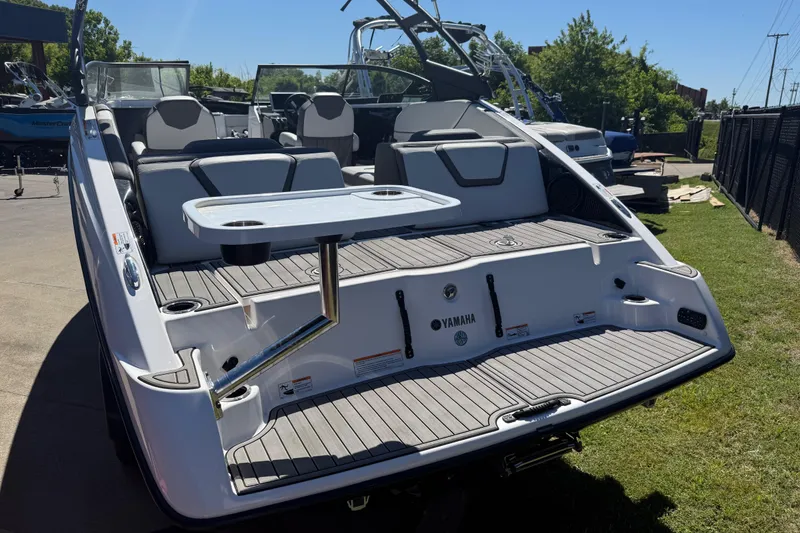 Slide: The Image of 2023 Yamaha Boats AR250 with sleek design, spacious seating, and modern amenities on display. - 38