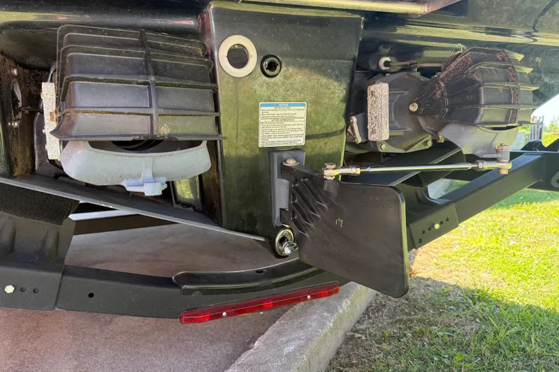 Slide: The Image of Rear view of 2023 Yamaha Boats AR250 jet propulsion system and steering components. - 39