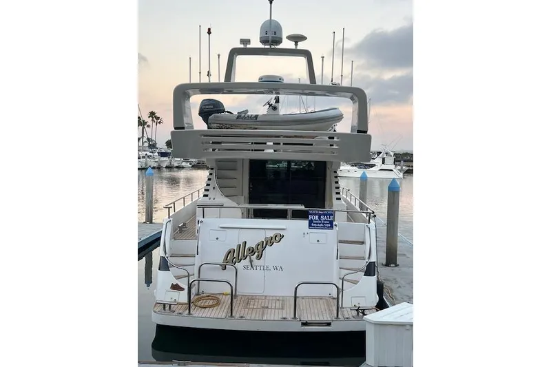 The Image of 1999 Horizon 70 Motor Yacht docked, rear view, with "For Sale" sign, Seattle, WA. - 0