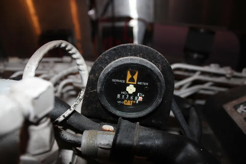 Slide: The Image of Service meter on 1999 Horizon 70 Motor Yacht engine, displaying hours used. - 31