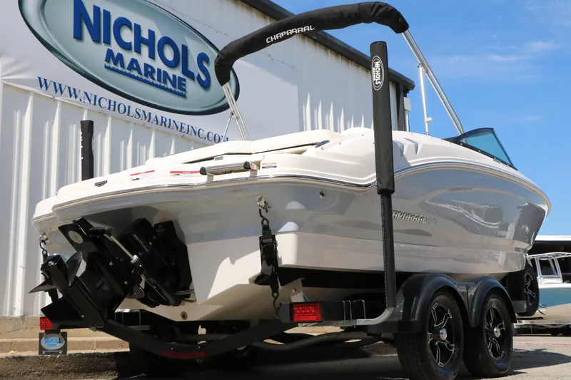 Slide: The Image of 2025 Chaparral 21 SSi Ski & Fish boat on trailer at Nichols Marine dealership. - 11