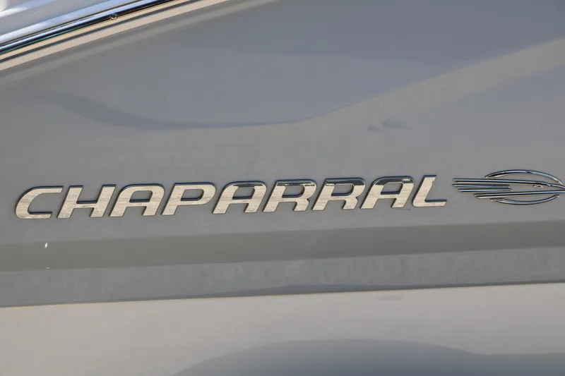 Slide: The Image of Chaparral 21 SSi Ski & Fish 2025 logo on boat exterior. - 12