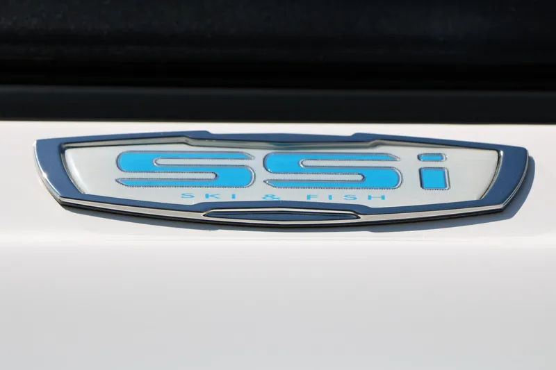 Slide: The Image of 2025 Chaparral 21 SSi Ski & Fish emblem with blue lettering on a white background. - 14