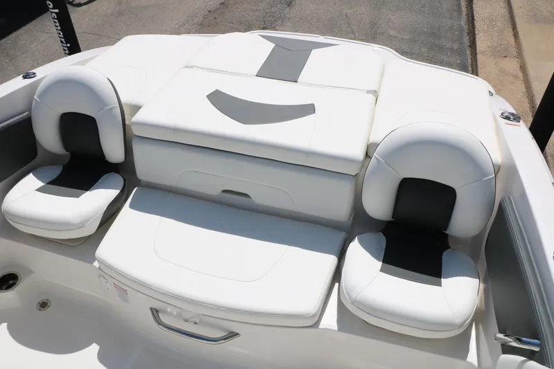 Slide: The Image of 2025 Chaparral 21 SSi Ski & Fish boat interior with white cushioned seating. - 36