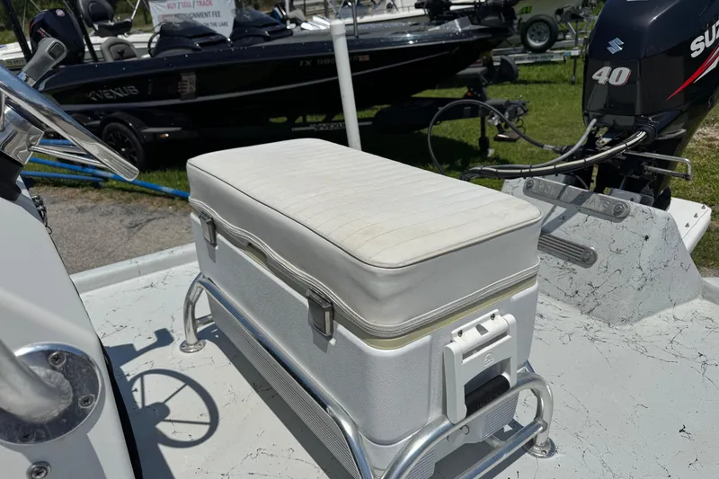 Slide: The Image of 2014 Mowdy 13 Scooter boat with Suzuki 40 engine and cushioned seat. - 3