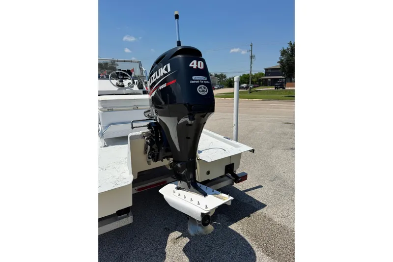 Slide: The Image of 2014 Mowdy 13 Scooter boat with Suzuki 40 horsepower outboard motor. - 6