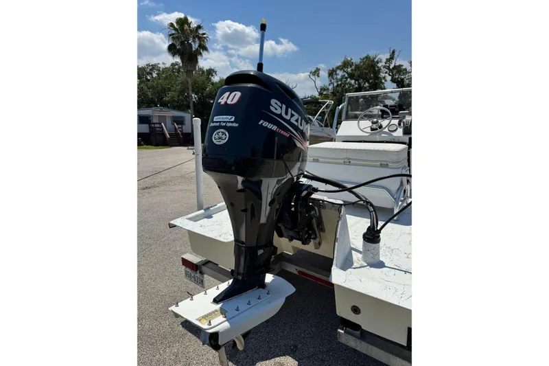 Slide: The Image of 2014 Mowdy 13 Scooter boat with Suzuki 40 horsepower outboard motor. - 7