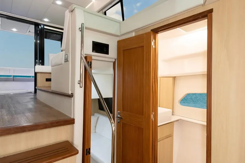 Slide: The Image of Manufacturer Provided Image: Interior of 2026 Regal 42 Fly yacht, featuring wooden doors and modern design elements. - 7
