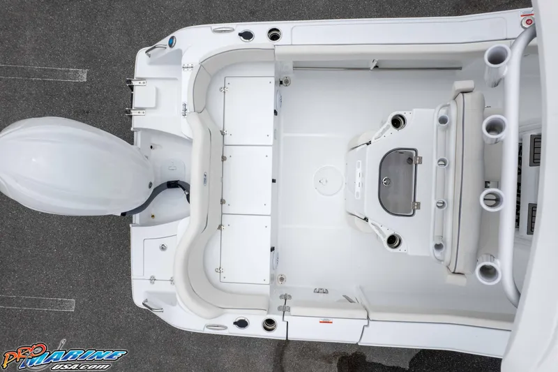 Slide: The Image of Top view of 2026 Sea Hunt Ultra 245 SE boat interior, showcasing seating and storage. - 18