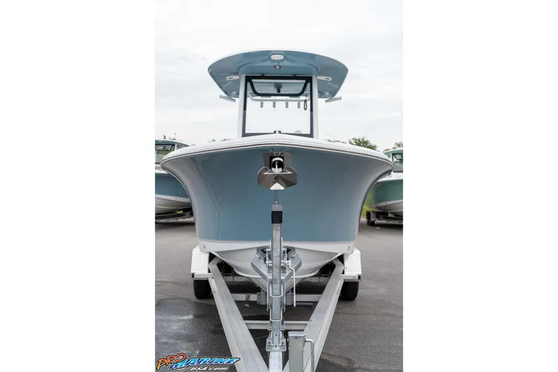 Slide: The Image of 2026 Sea Hunt Ultra 245 SE boat on trailer, front view. - 24