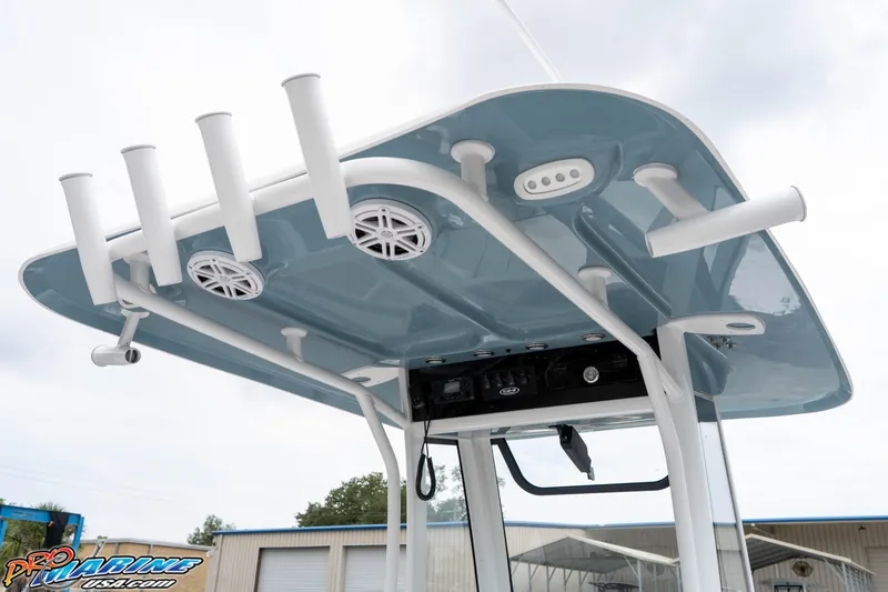 Slide: The Image of 2026 Sea Hunt Ultra 245 SE boat T-top with rod holders and speakers. - 40