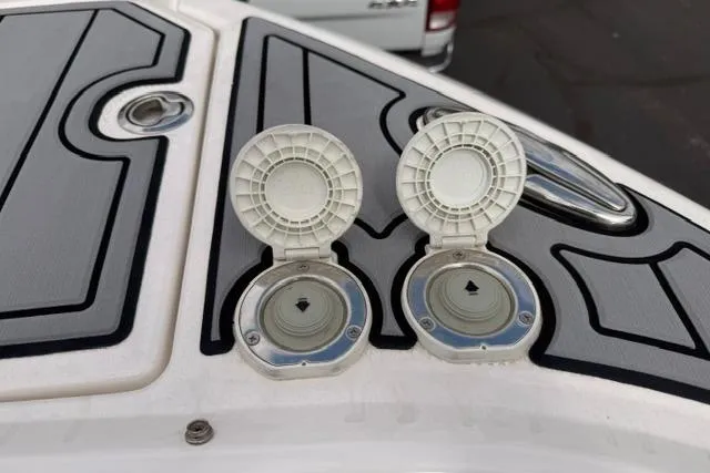 Slide: The Image of Fuel caps on a 2019 Chaparral 277 SSX boat deck. - 22