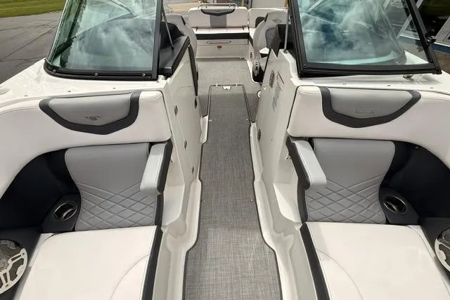 Slide: The Image of 2019 Chaparral 277 SSX boat interior with gray and white seating. - 24
