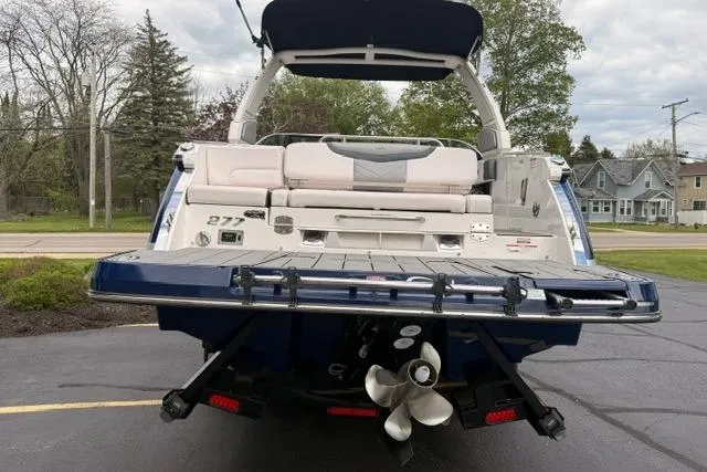 Slide: The Image of 2019 Chaparral 277 SSX boat rear view with propeller and swim platform. - 3