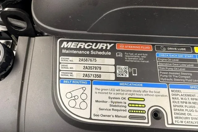 Slide: The Image of Engine maintenance label on a 2019 Chaparral 277 SSX boat, featuring Mercury serial numbers. - 31