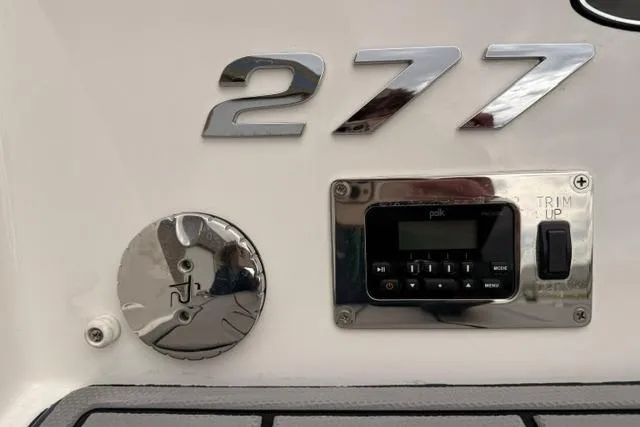 Slide: The Image of 2019 Chaparral 277 SSX boat detail with control panel and model number. - 40