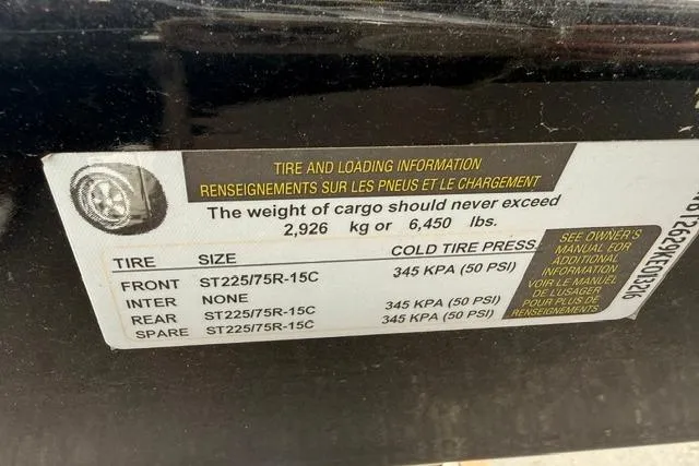 Slide: The Image of Tire and loading information label on a 2019 Chaparral 277 SSX, showing weight and pressure details. - 45