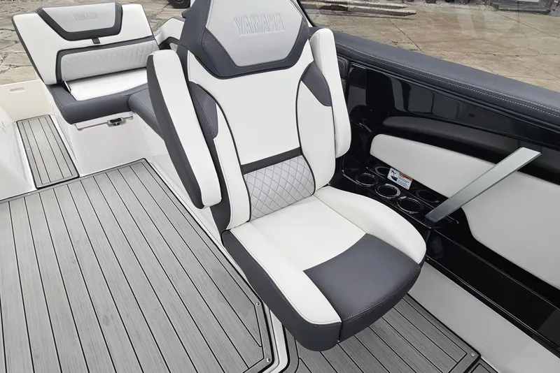 Slide: The Image of 2023 Yamaha Boats 275SDX interior with sleek seating and modern design. - 21