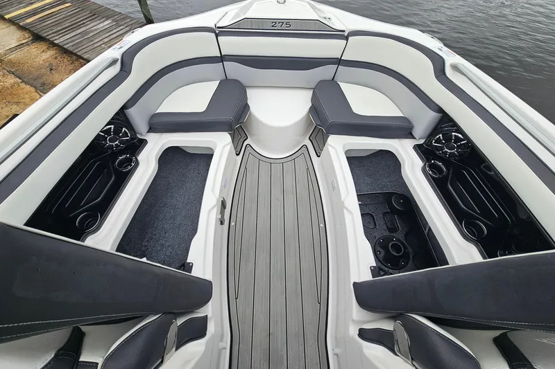 Slide: The Image of 2023 Yamaha Boats 275SDX interior with sleek seating and modern design. - 24