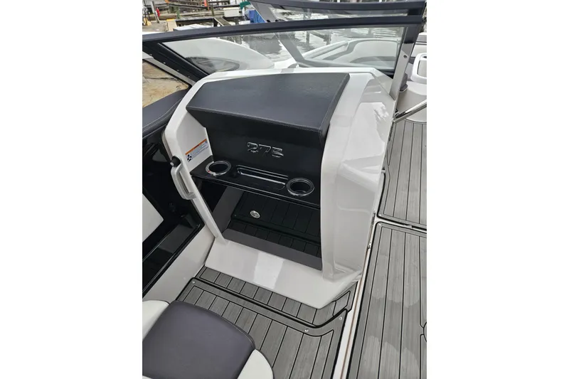 Slide: The Image of 2023 Yamaha Boats 275SDX interior with sleek seating and modern design. - 27