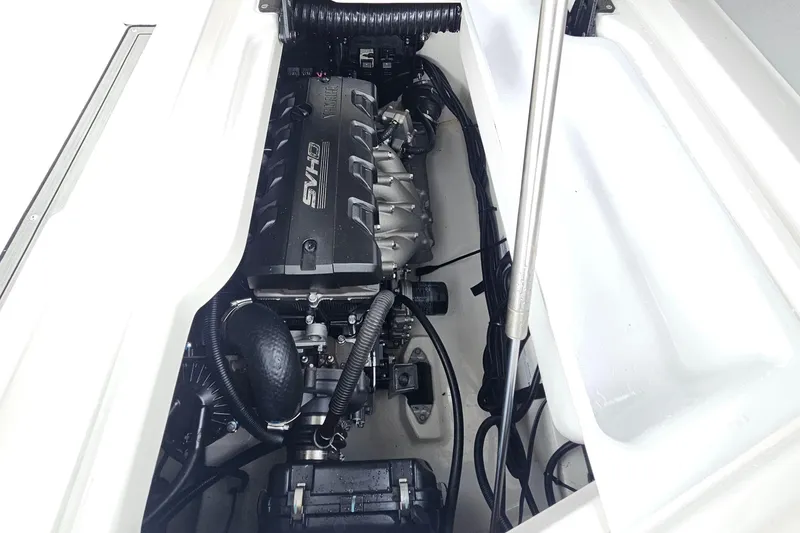 Slide: The Image of Engine compartment of 2023 Yamaha Boats 275SDX, showcasing SVHO engine components. - 33